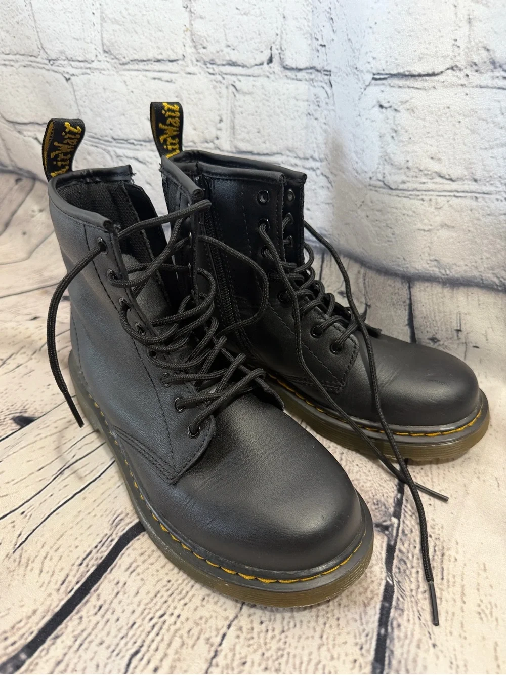 Dr. Martens Black Leather Combat Boots with Yellow Stitching